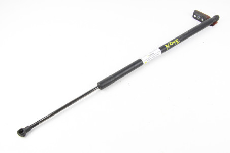 Амортизатор кришки багажника лівий Nissan Note (E11) 2006-2013 904509U00A (4026)