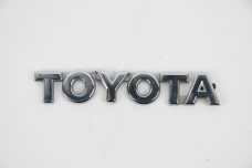 Напис кришки багажника Toyota Corolla E12 (E120) 2000-2006 7544112840 (46903)