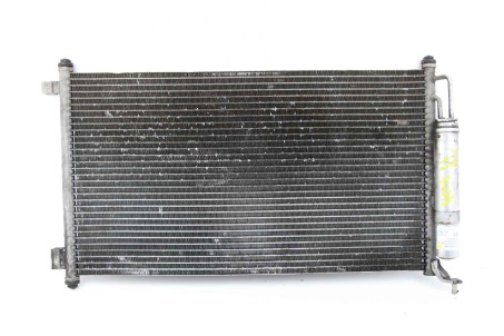 Радиатор кондиционера 1.6 АКПП 09- Nissan Note (E11) 2006-2013 92100AX80B (56830)