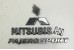 Эмблема на крышку багажника Mitsubishi Pajero Sport (KH) 2008–2015 7415A368 / MR108148 / 7415A308 (60095)